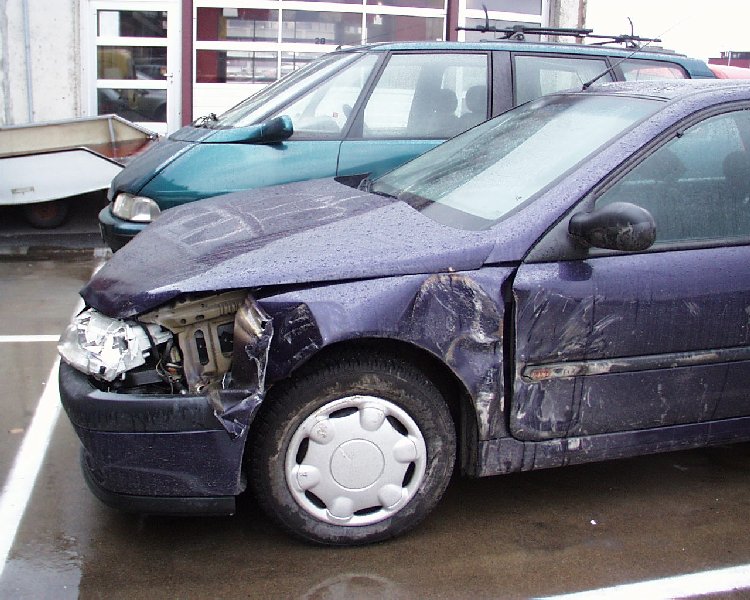 The Renault Laguna was totalled November 2002, got hit by a truck on the 
